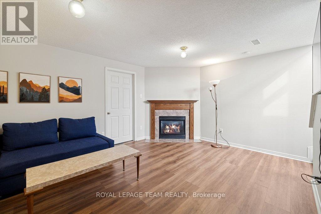 1493 Demeter Street, Ottawa, ON - Indoor Photo Showing Living Room With Fireplace