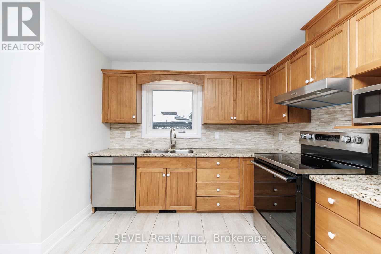 Kitchen - 1452 Allanport Road, Thorold (Port Robinson), ON - Indoor Photo Showing Kitchen With Double Sink