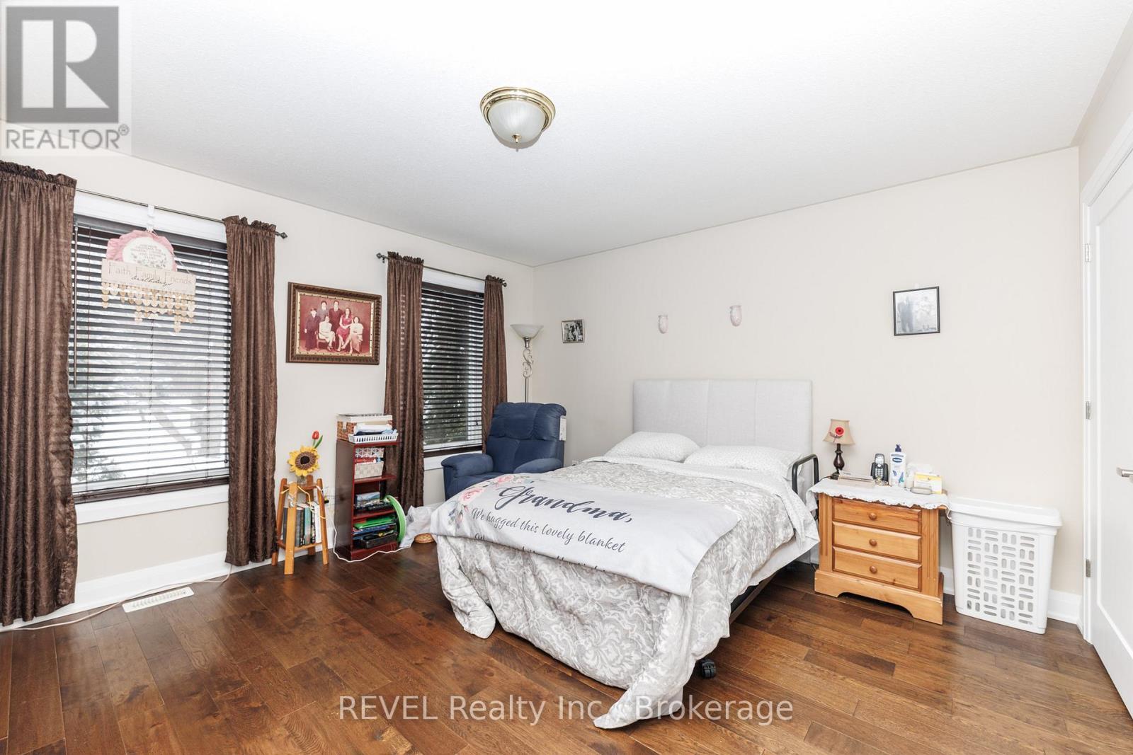 M/F Bedroom - 1452 Allanport Road, Thorold (Port Robinson), ON - Indoor Photo Showing Bedroom