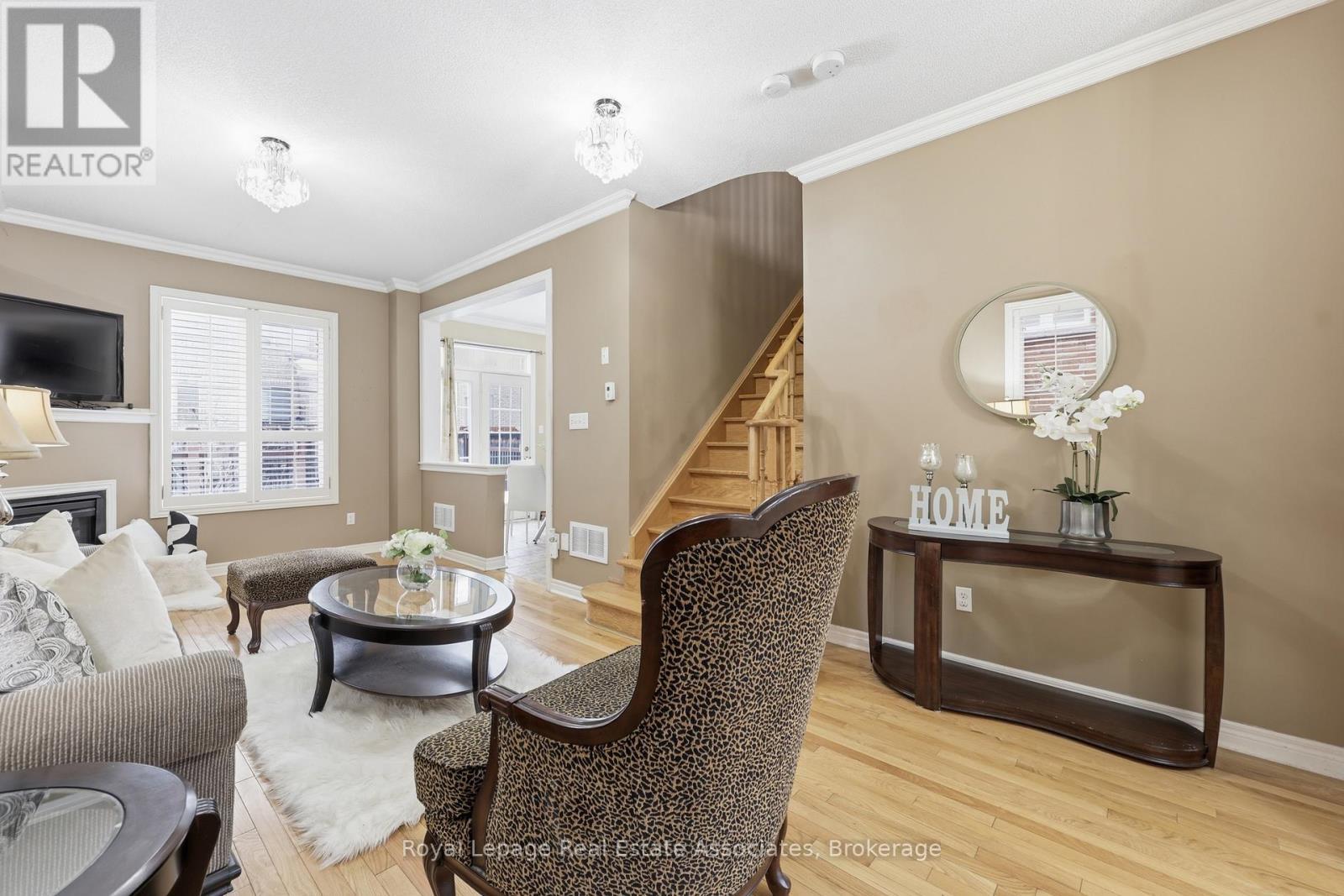 Living/Family with Gas Fireplace - 26 Prebble Drive, Markham, ON - Indoor Photo Showing Living Room