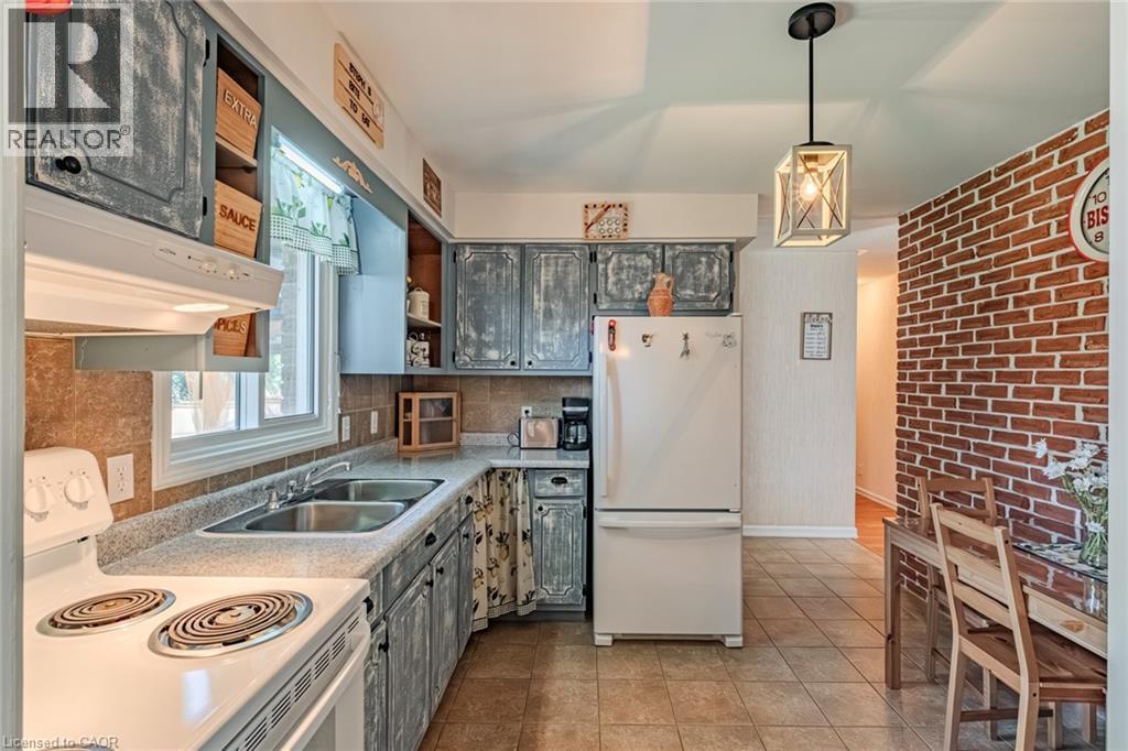26 Douglas Avenue, Simcoe, ON - Indoor Photo Showing Kitchen With Double Sink