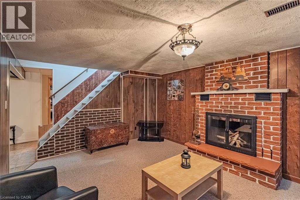 26 Douglas Avenue, Simcoe, ON - Indoor Photo Showing Living Room With Fireplace