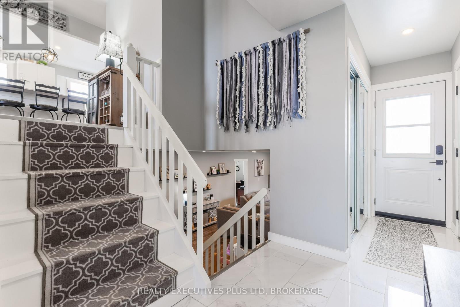 Back door to fully fenced yard and garage door - 363 Emerick Avenue, Fort Erie (Central), ON - Indoor Photo Showing Other Room