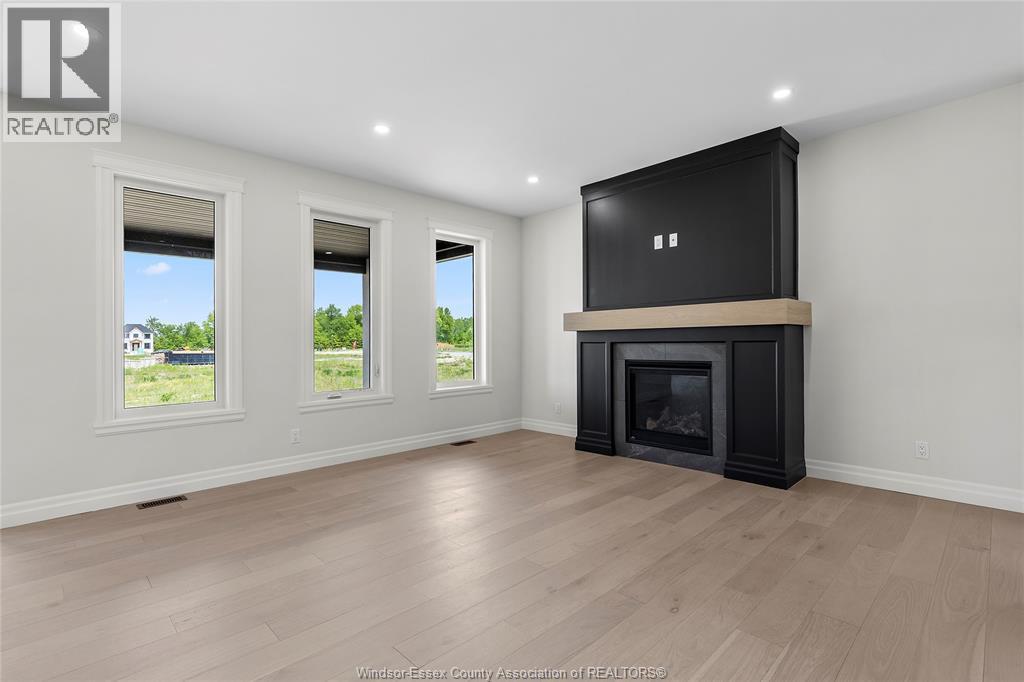 267 Joan Flood, Essex, ON - Indoor Photo Showing Living Room With Fireplace