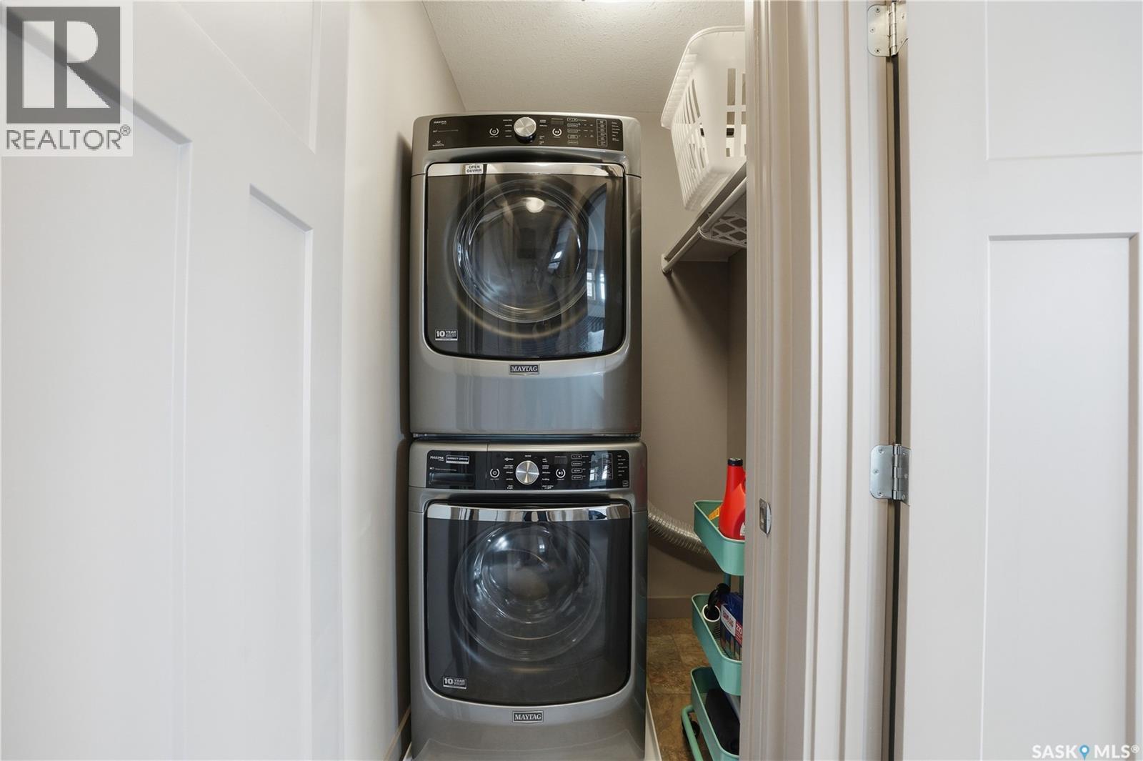 234 Maningas Bend, Saskatoon, SK - Indoor Photo Showing Laundry Room