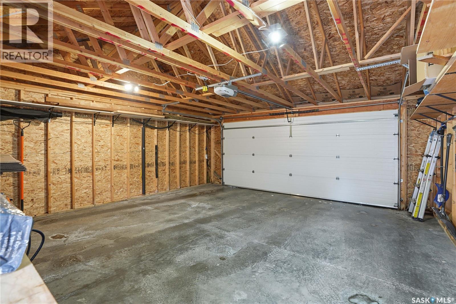 234 Maningas Bend, Saskatoon, SK - Indoor Photo Showing Garage