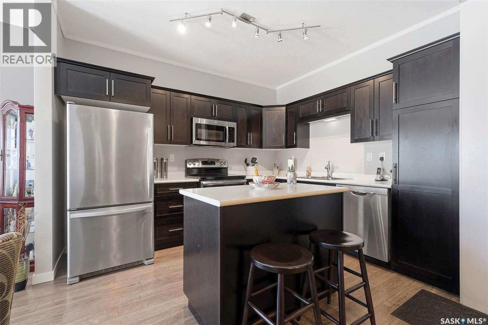 #113 545 Hassard Close, Saskatoon, SK - Indoor Photo Showing Kitchen With Stainless Steel Kitchen With Upgraded Kitchen