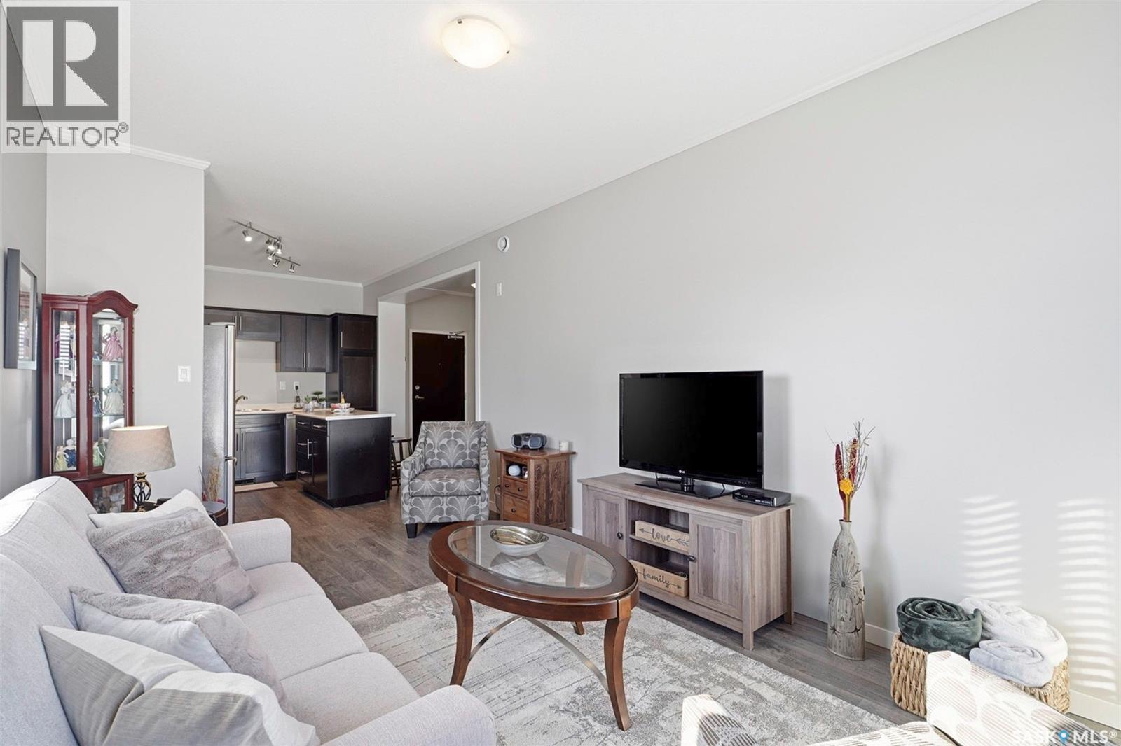 #113 545 Hassard Close, Saskatoon, SK - Indoor Photo Showing Living Room