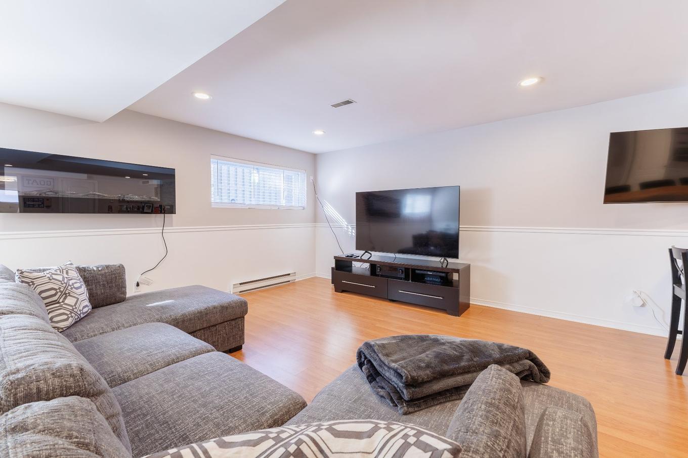 Basement - 349 Rue Roger-Pilon, Dollard-Des-Ormeaux, QC - Indoor Photo Showing Living Room