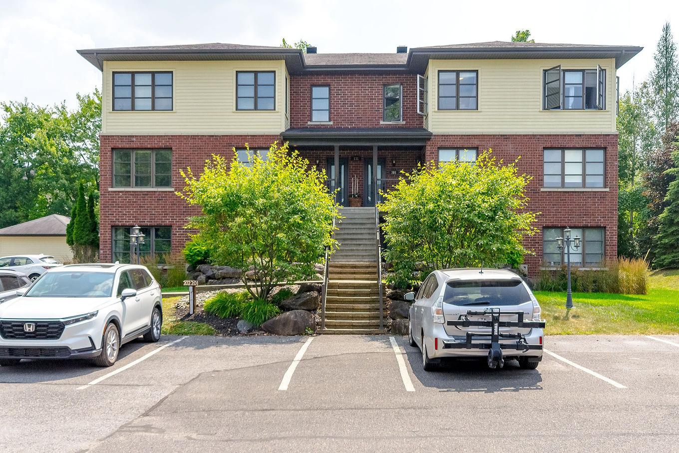 Parking - 202-131 Rue De Laviolette, Bromont, QC - Outdoor With Facade