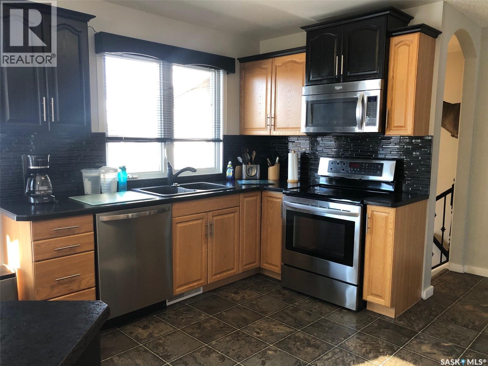 146 Jubilee Crescent, Canora, SK - Indoor Photo Showing Kitchen With Stainless Steel Kitchen With Double Sink