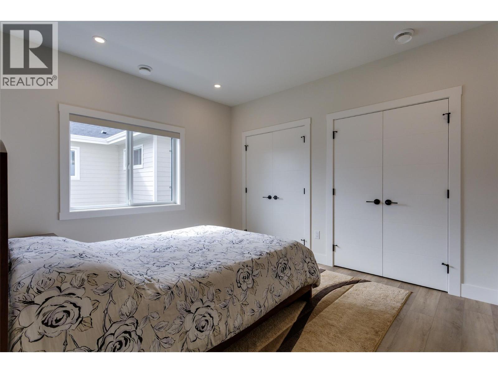 703 Carnoustie Drive, Kelowna, BC - Indoor Photo Showing Bedroom