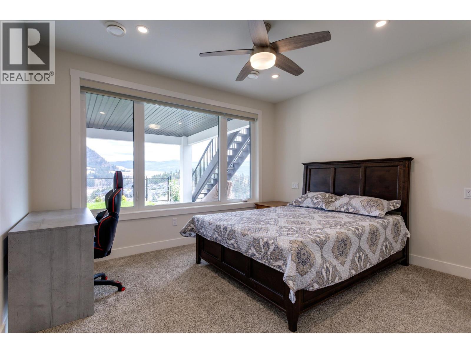 703 Carnoustie Drive, Kelowna, BC - Indoor Photo Showing Bedroom
