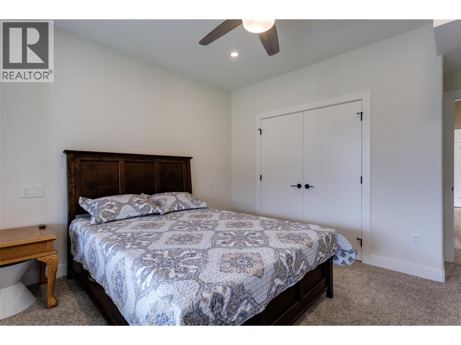 703 Carnoustie Drive, Kelowna, BC - Indoor Photo Showing Bedroom