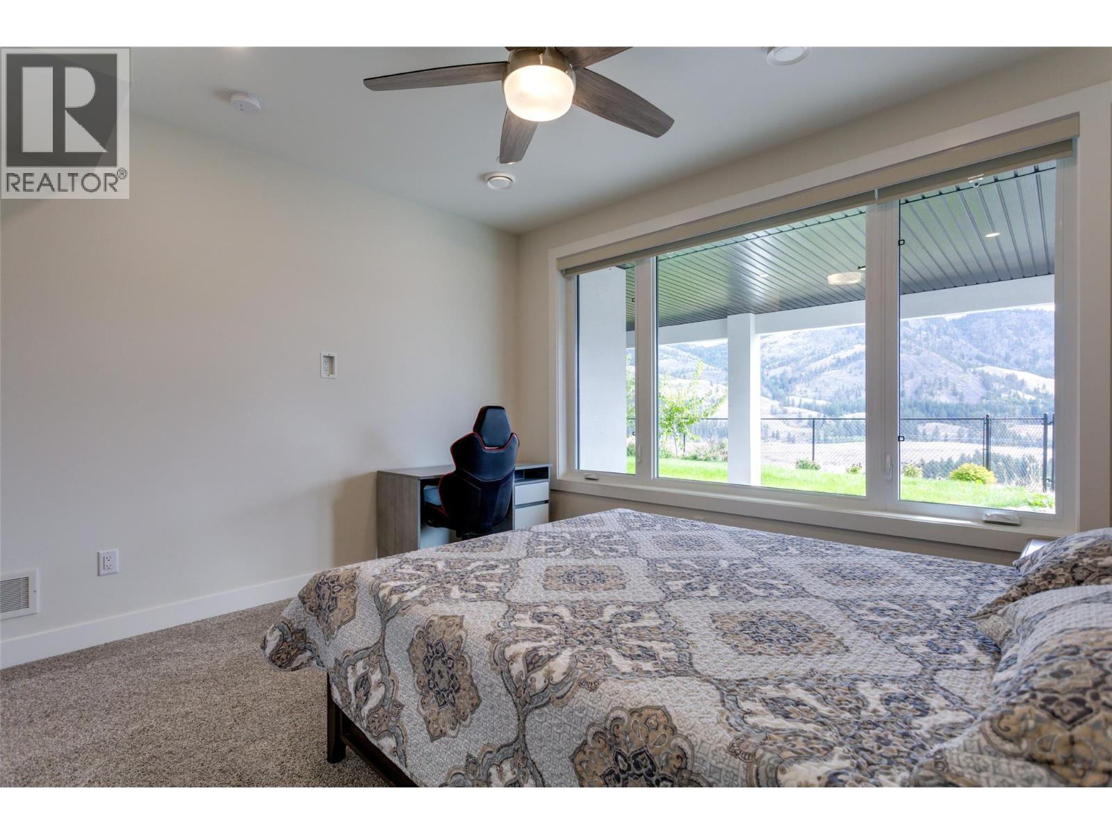 703 Carnoustie Drive, Kelowna, BC - Indoor Photo Showing Bedroom