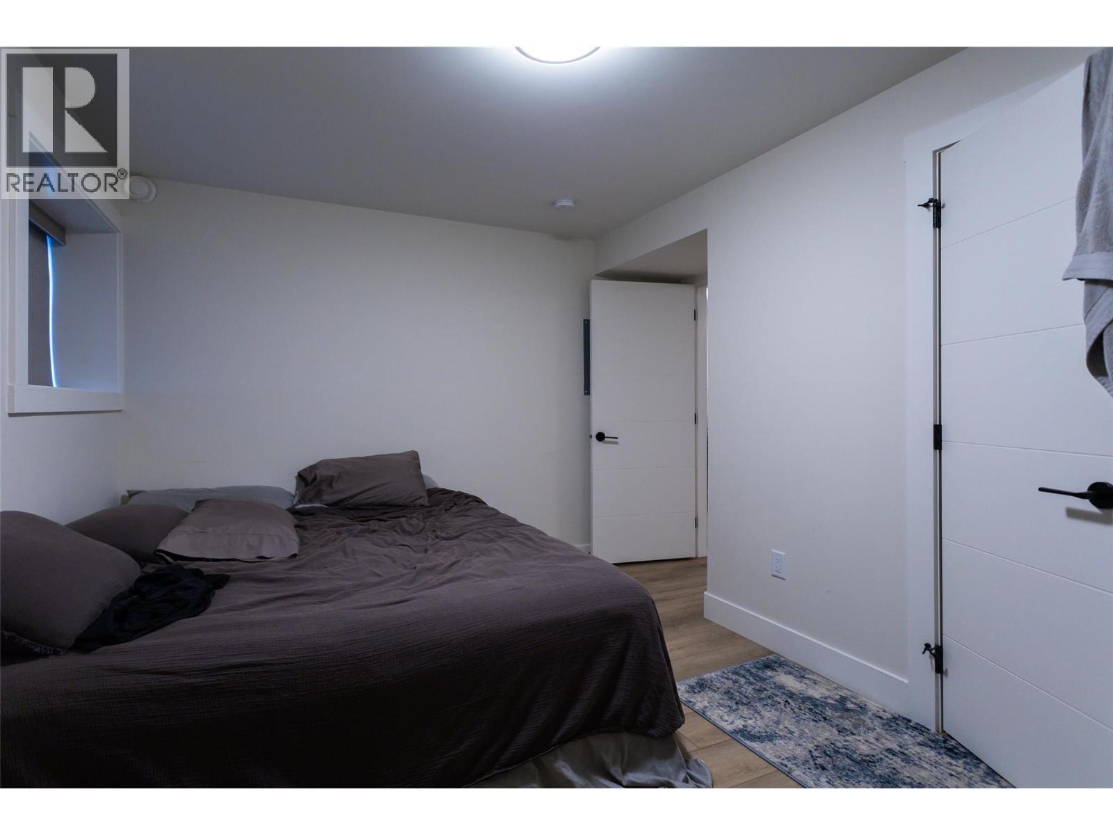 703 Carnoustie Drive, Kelowna, BC - Indoor Photo Showing Bedroom