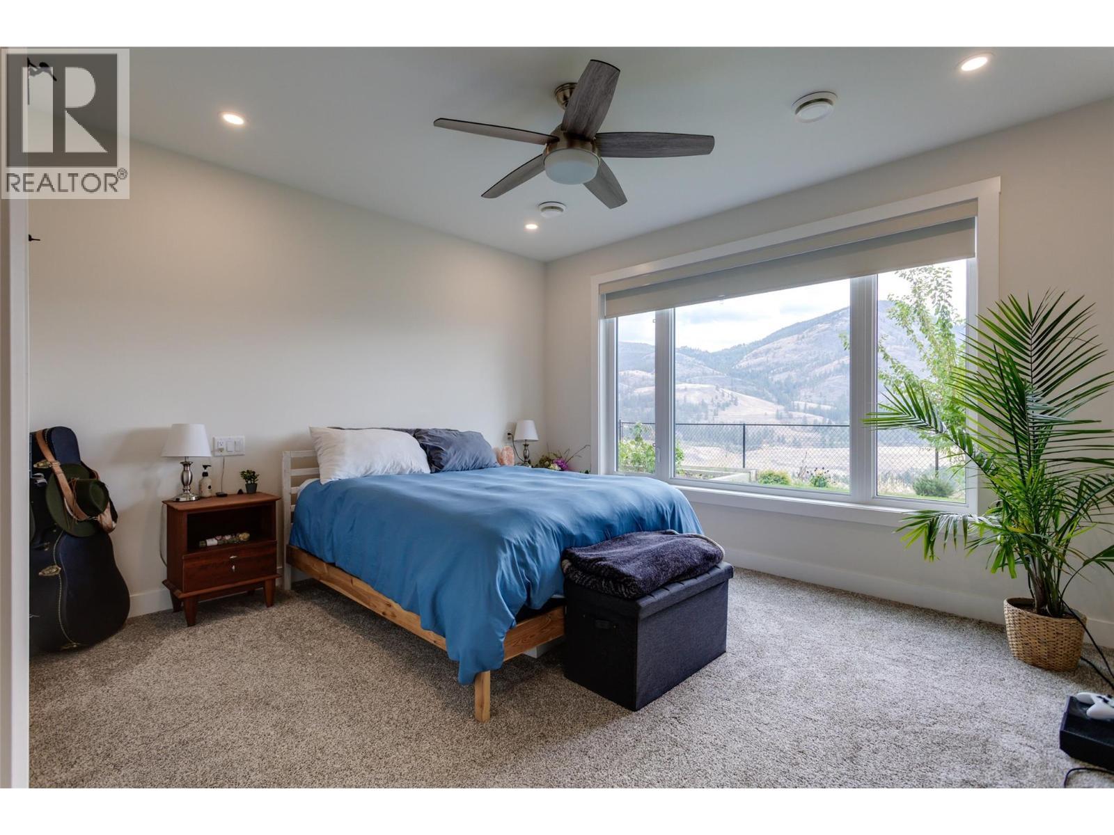 703 Carnoustie Drive, Kelowna, BC - Indoor Photo Showing Bedroom