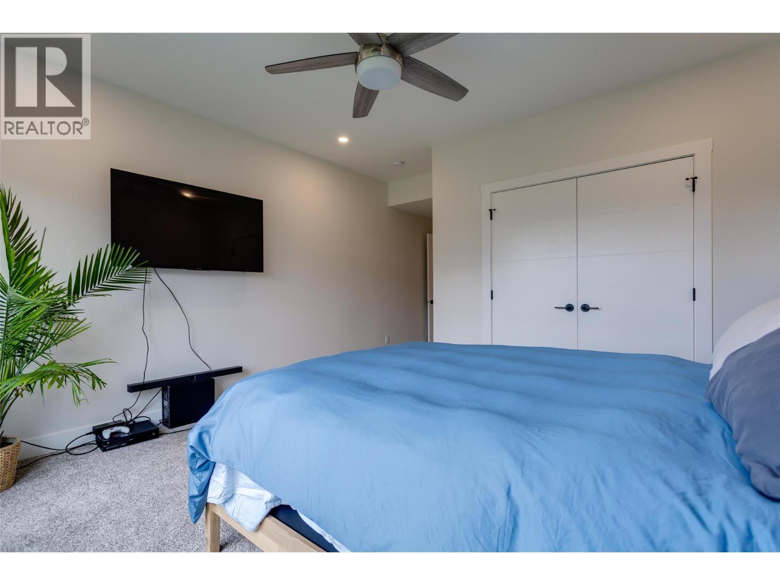 703 Carnoustie Drive, Kelowna, BC - Indoor Photo Showing Bedroom