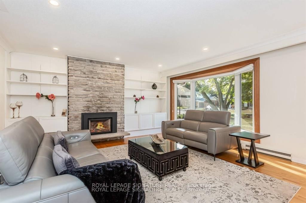 153 Ulster Drive, Oakville, ON - Indoor Photo Showing Living Room With Fireplace