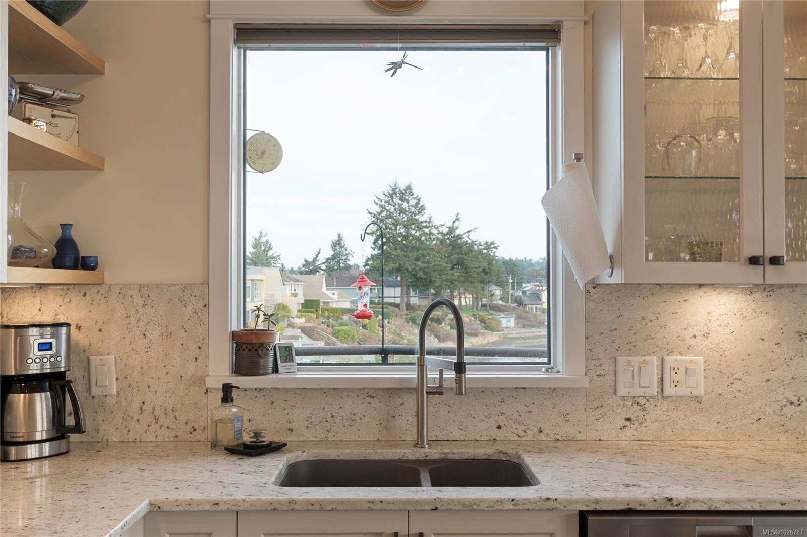 201-9949 Third St, Sidney, BC - Indoor Photo Showing Kitchen With Double Sink