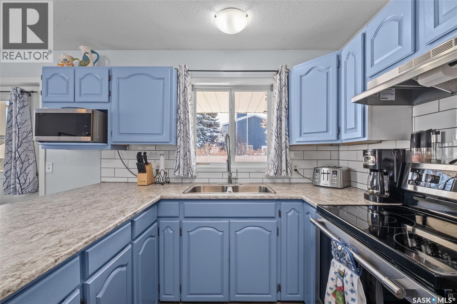 1503 Bliss Crescent, Prince Albert, SK - Indoor Photo Showing Kitchen With Double Sink