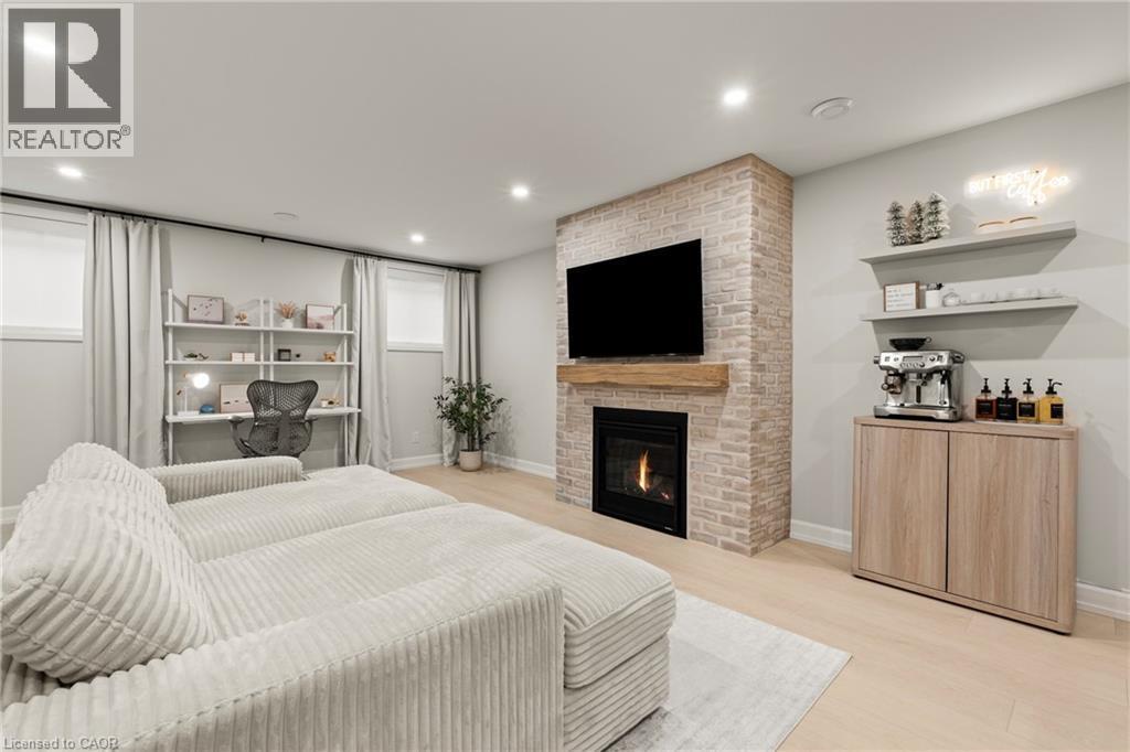 27 Maple Leaf Avenue S, Ridgeway, ON - Indoor Photo Showing Other Room With Fireplace