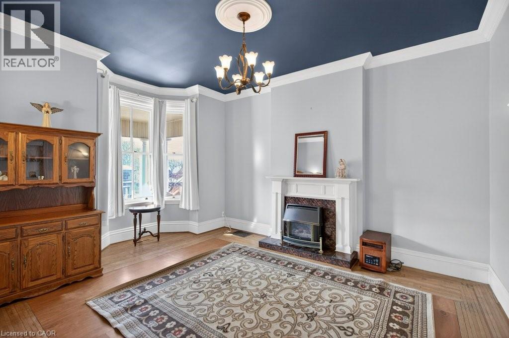282 Main Street W, Hamilton, ON - Indoor Photo Showing Other Room With Fireplace