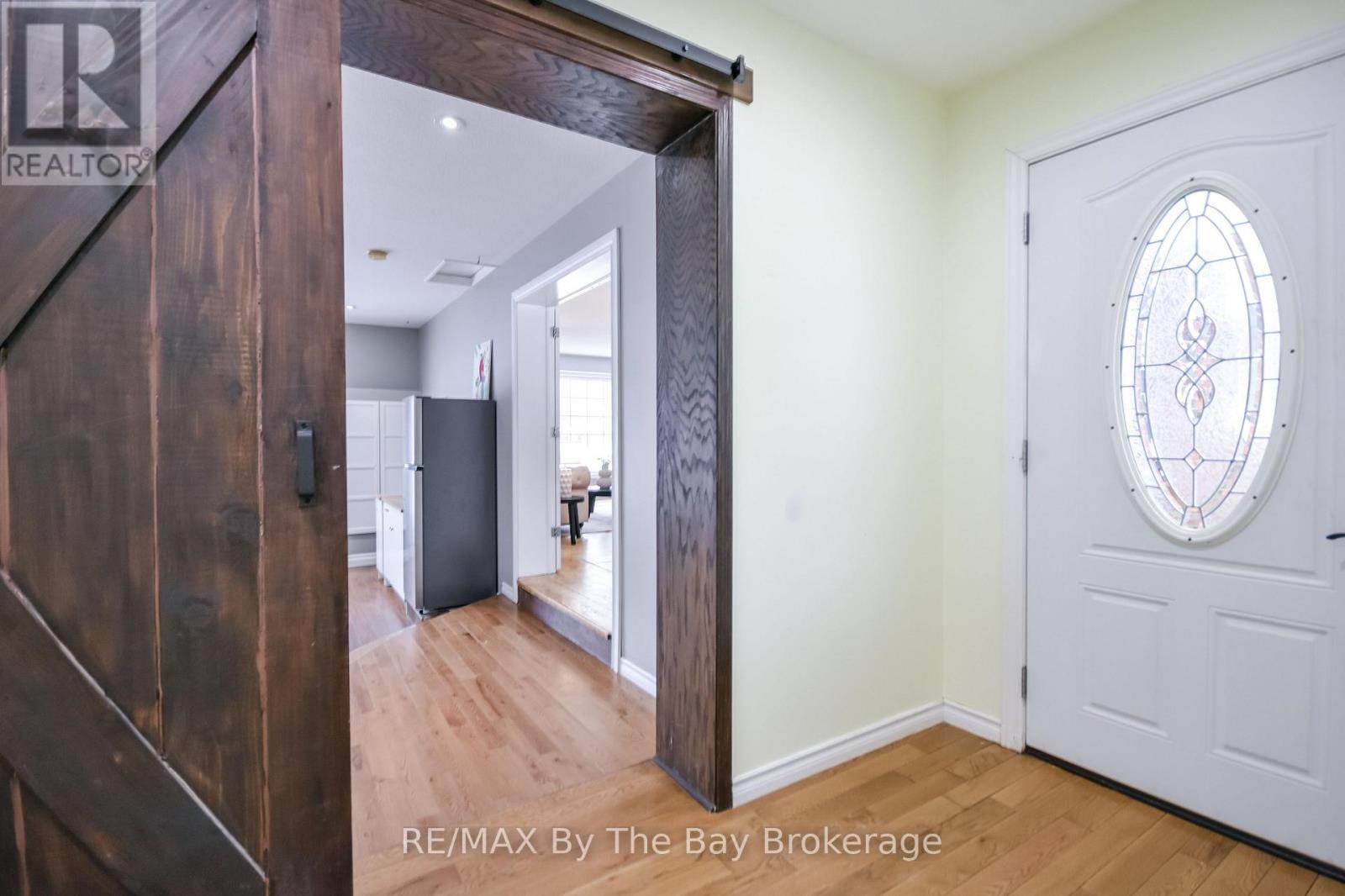Barn Door - 111 Balm Beach Road E, Tiny, ON - Indoor Photo Showing Other Room