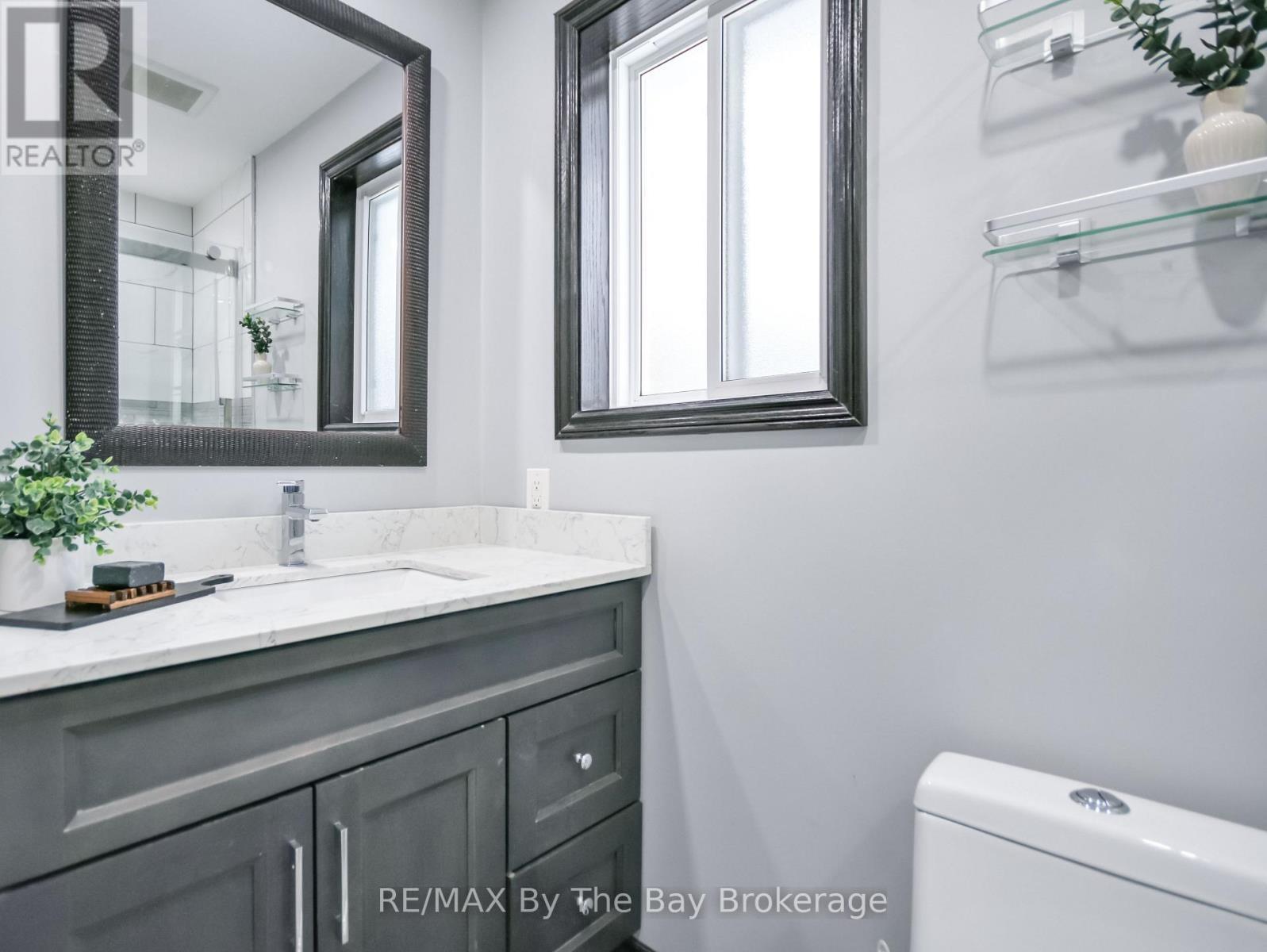 Ensite Bathroom - 111 Balm Beach Road E, Tiny, ON - Indoor Photo Showing Bathroom