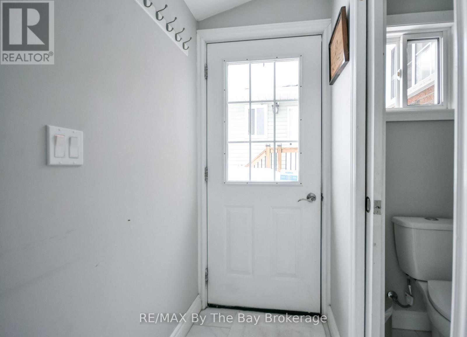 Separate Entrance. - 111 Balm Beach Road E, Tiny, ON - Indoor Photo Showing Other Room