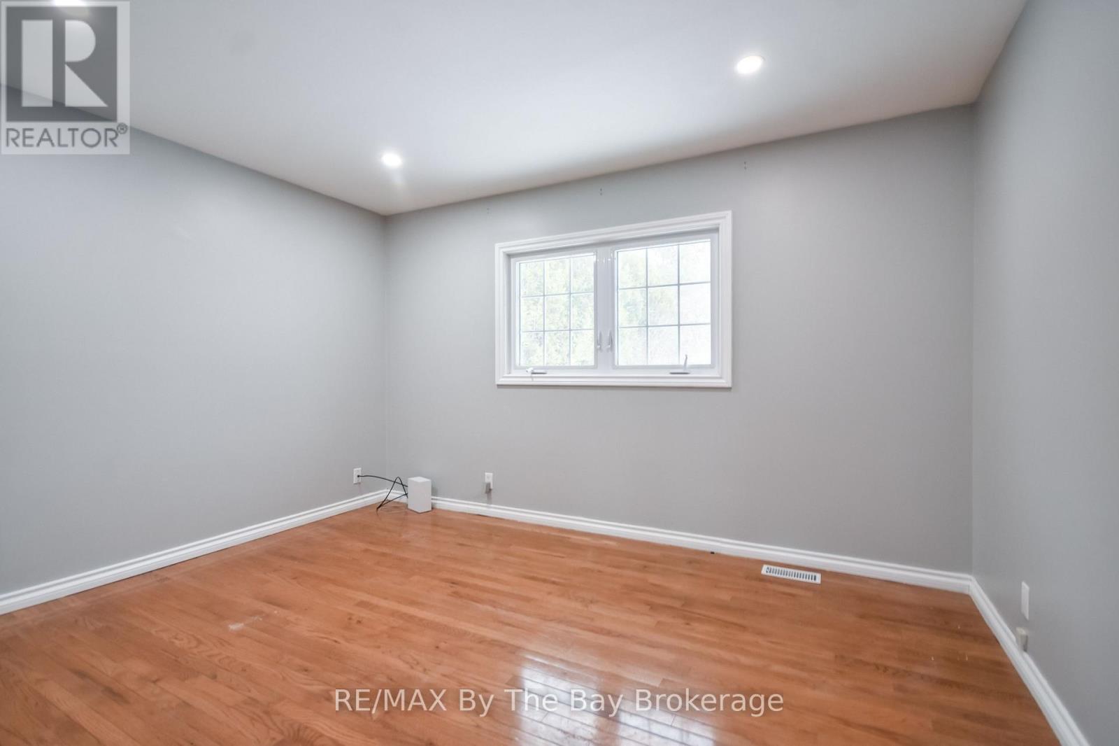 Bedroom 2 - Main Level - 111 Balm Beach Road E, Tiny, ON - Indoor Photo Showing Other Room