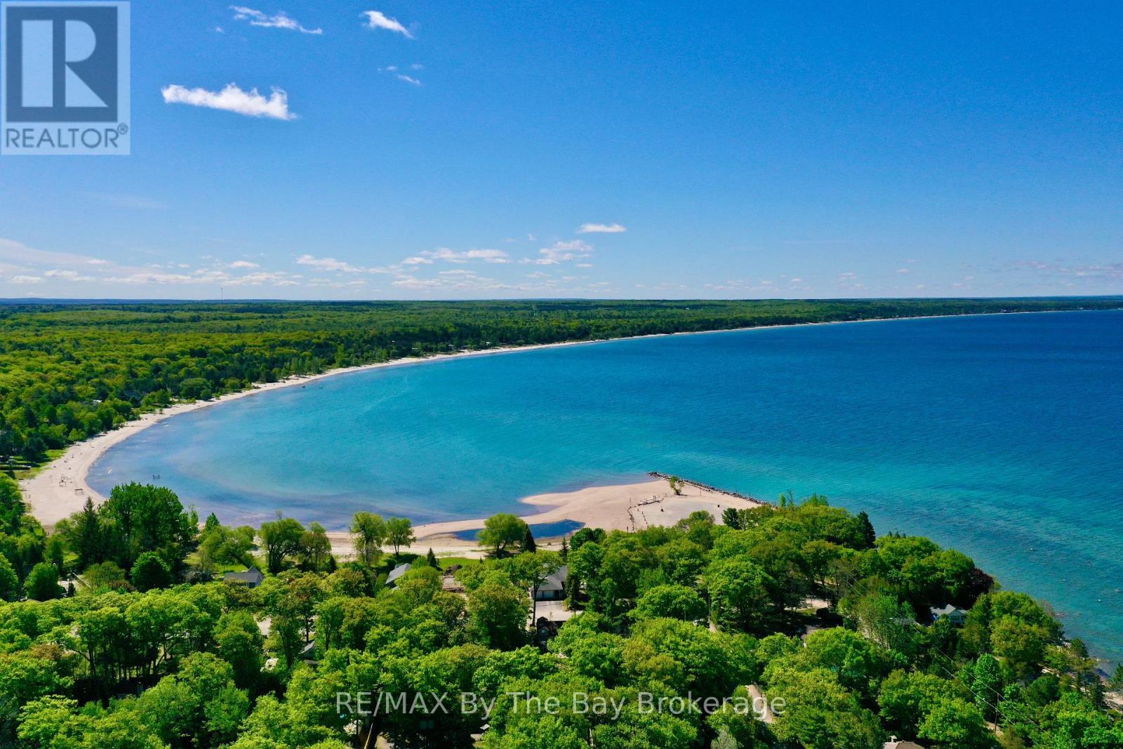 Minutes to Sandy Beaches - 111 Balm Beach Road E, Tiny, ON - Outdoor With Body Of Water With View