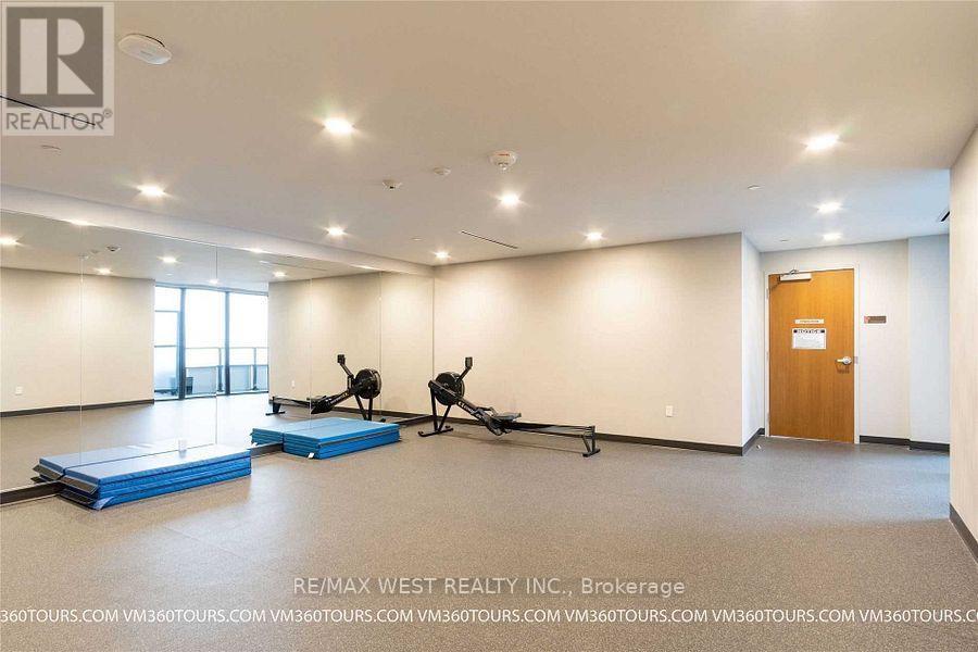 5111 - 30 Shore Breeze Drive, Toronto, ON - Indoor Photo Showing Gym Room
