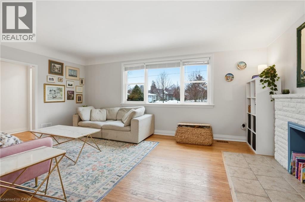 59 Oakley Court, Ancaster, ON - Indoor Photo Showing Living Room With Fireplace