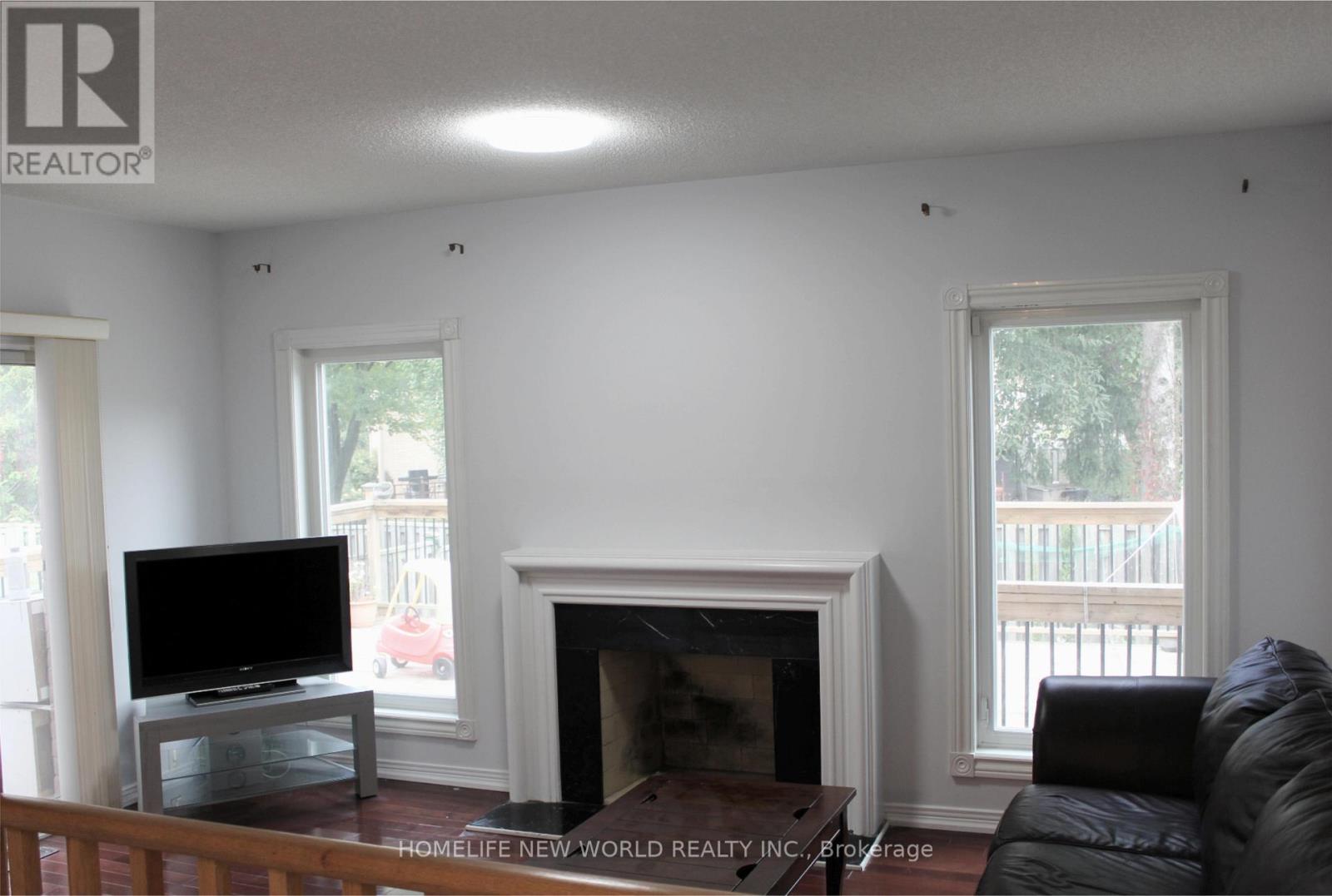328 Port Royal Trail, Toronto, ON - Indoor Photo Showing Living Room With Fireplace