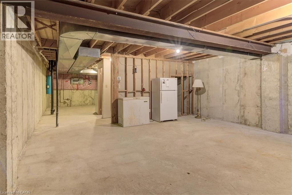 Built to last, this home features solid steel beam and concrete construction for peace of mind. - 42 Donly Drive S Unit# 2, Simcoe, ON - Indoor Photo Showing Basement