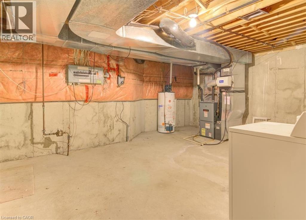 This spacious basement with high ceilings is ready for your personal touch, offering endless possibilities for a rec room or home gym. - 42 Donly Drive S Unit# 2, Simcoe, ON - Indoor
