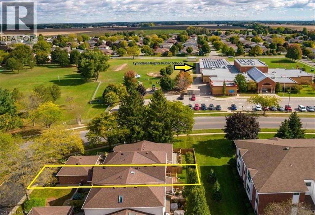 Just steps from a local elementary school, this home offers easy access for families with young children. - 42 Donly Drive S Unit# 2, Simcoe, ON - Outdoor With View