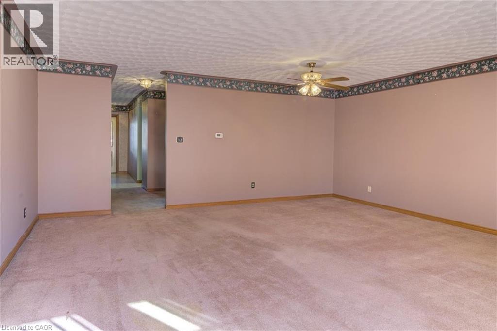 This versatile living space has room to add a dining table, making it ideal for hosting friends or family dinners. - 42 Donly Drive S Unit# 2, Simcoe, ON - Indoor Photo Showing Other Room