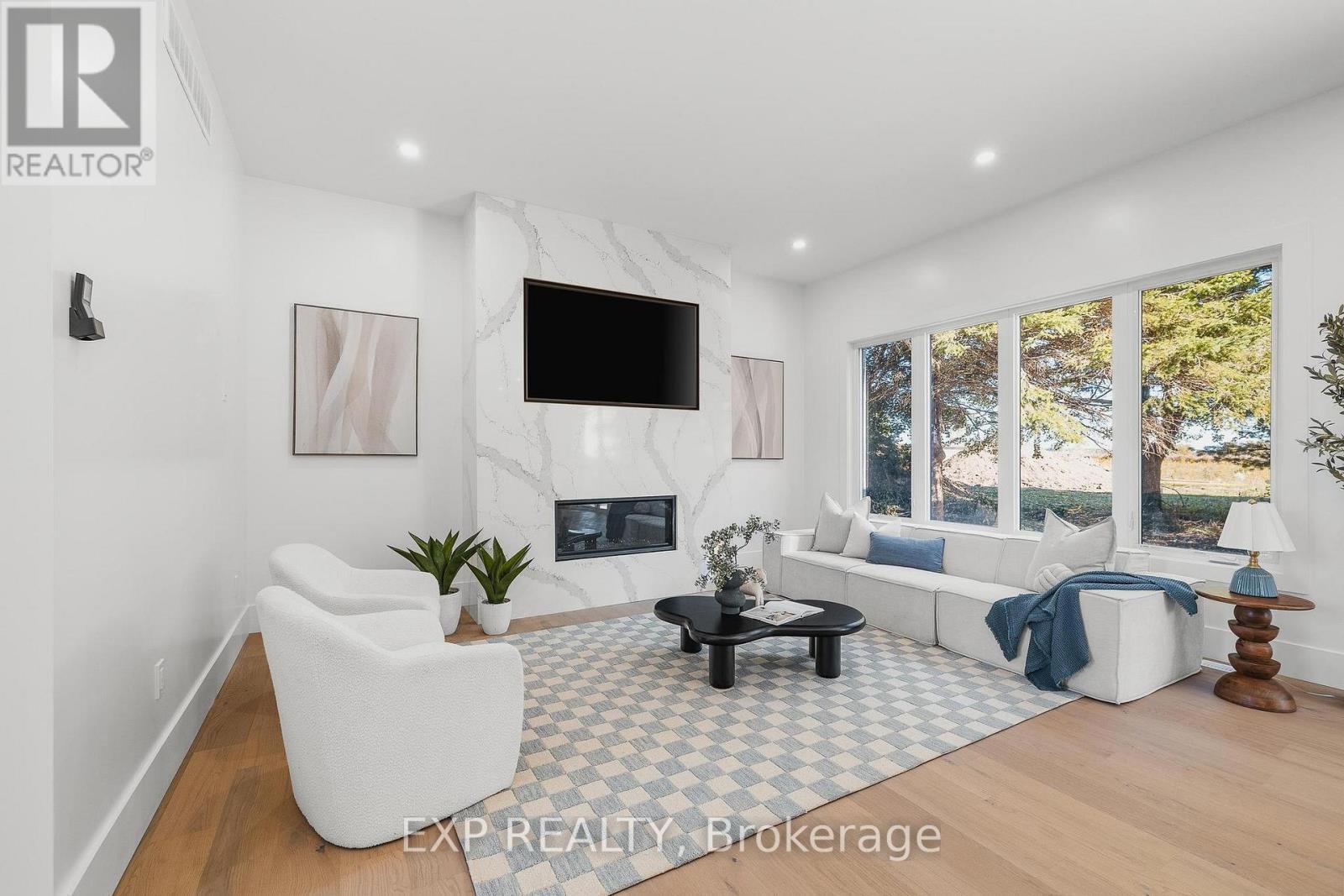 1060 Walton Avenue, North Perth, ON - Indoor With Fireplace