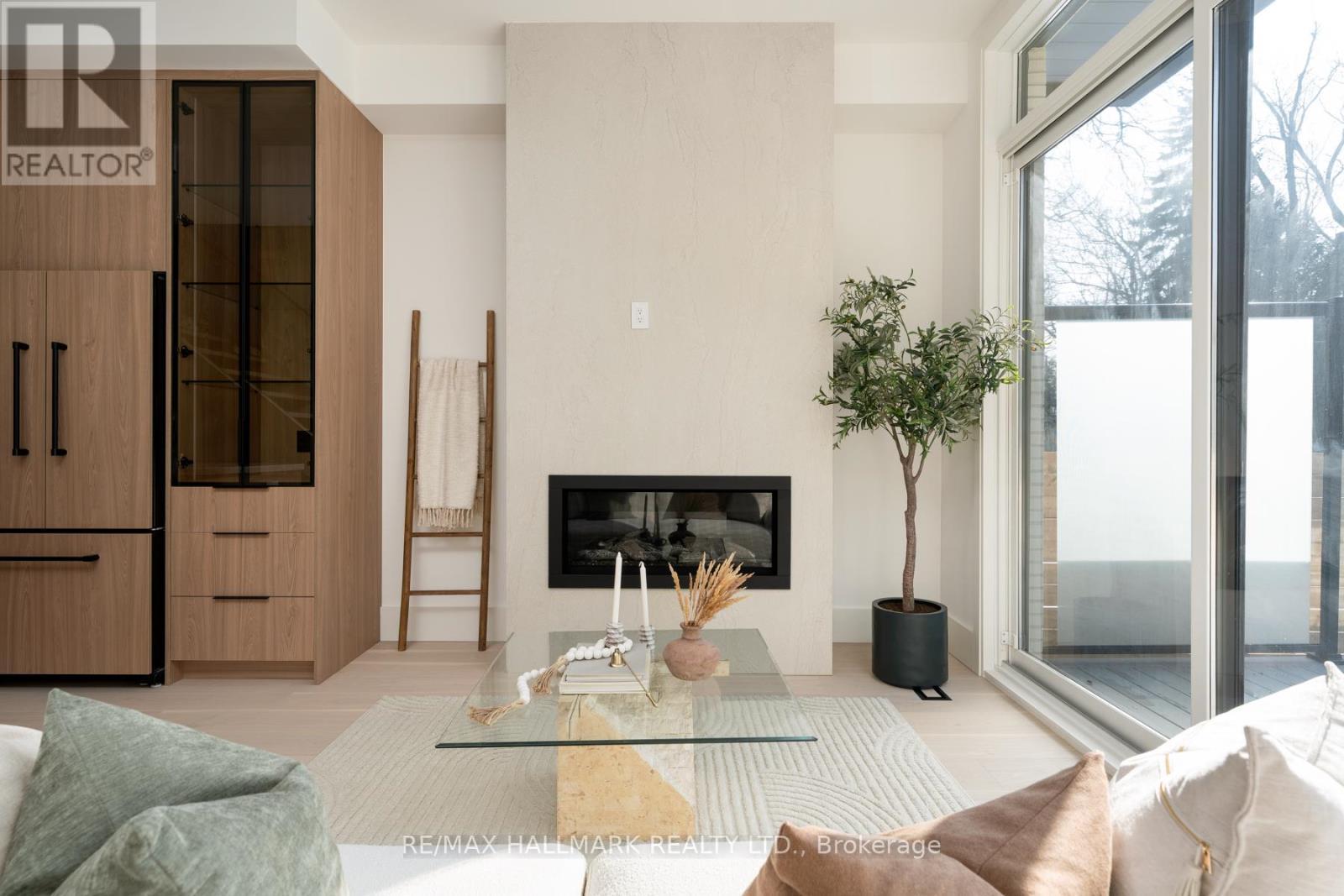72 Marmot Street, Toronto, ON - Indoor Photo Showing Living Room With Fireplace