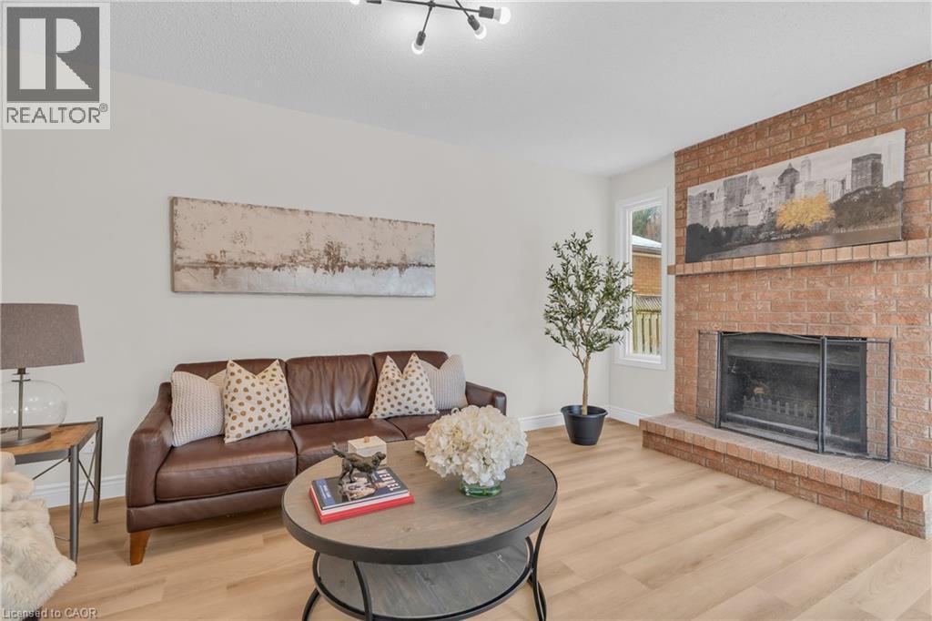 1 Balfour Court, Guelph, ON - Indoor Photo Showing Living Room With Fireplace
