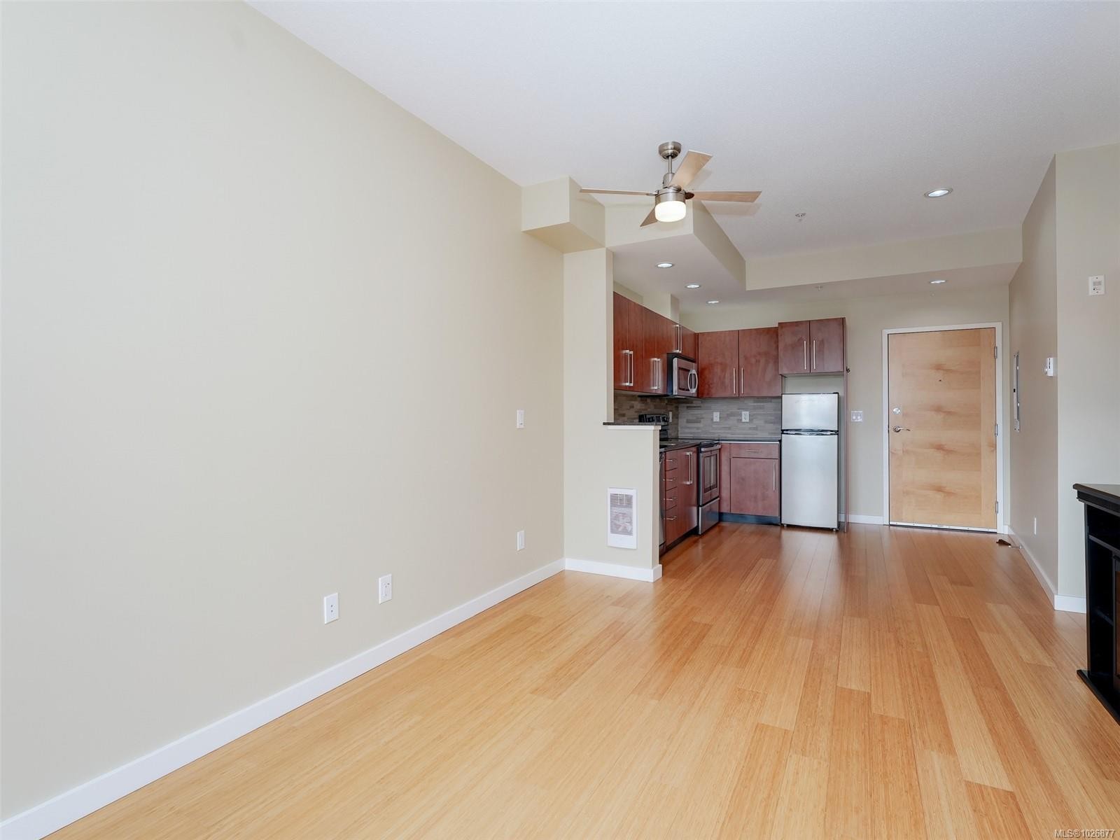 404-611 Brookside Rd, Colwood, BC - Indoor Photo Showing Kitchen With Fireplace