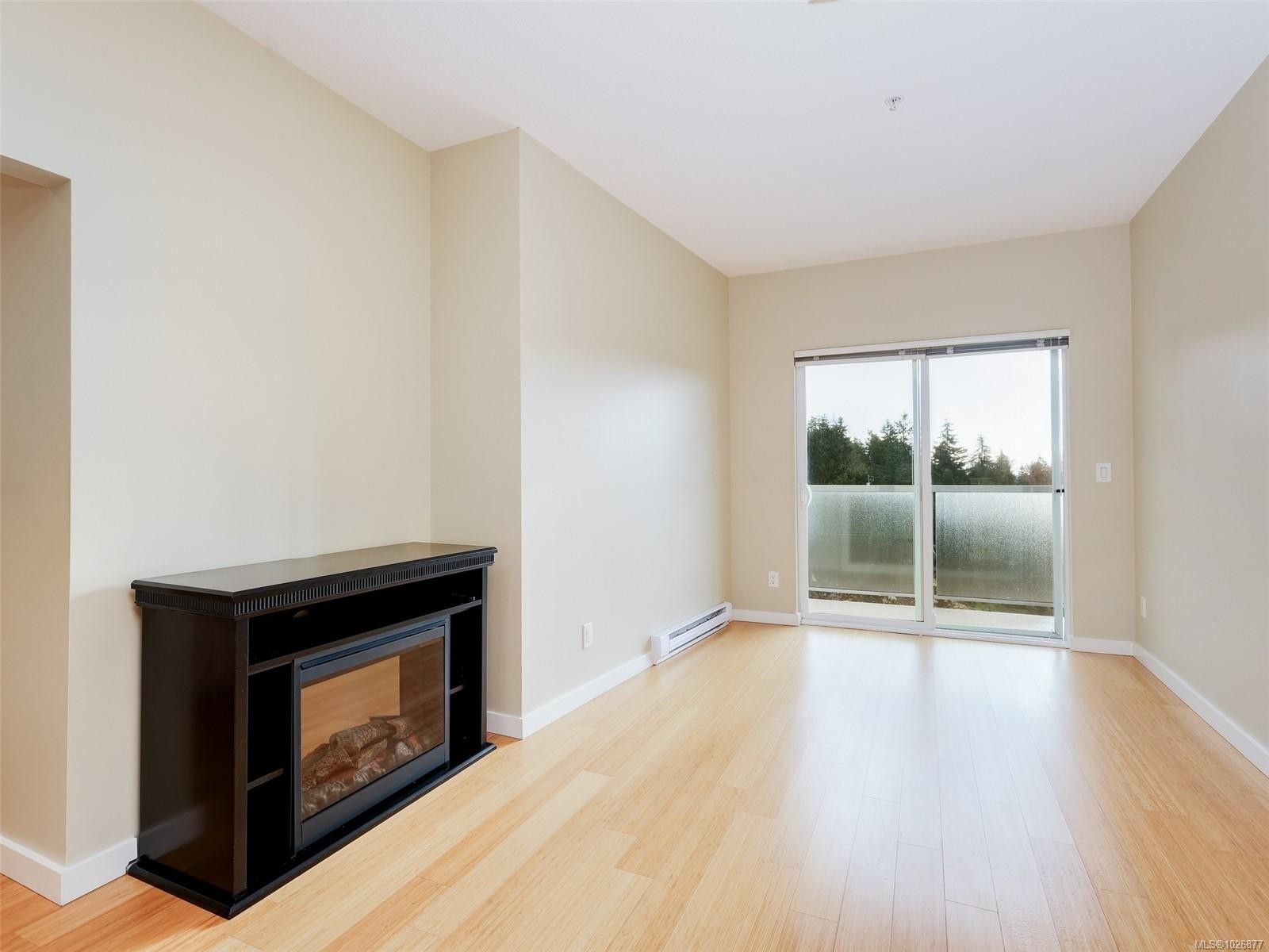 404-611 Brookside Rd, Colwood, BC - Indoor Photo Showing Living Room With Fireplace