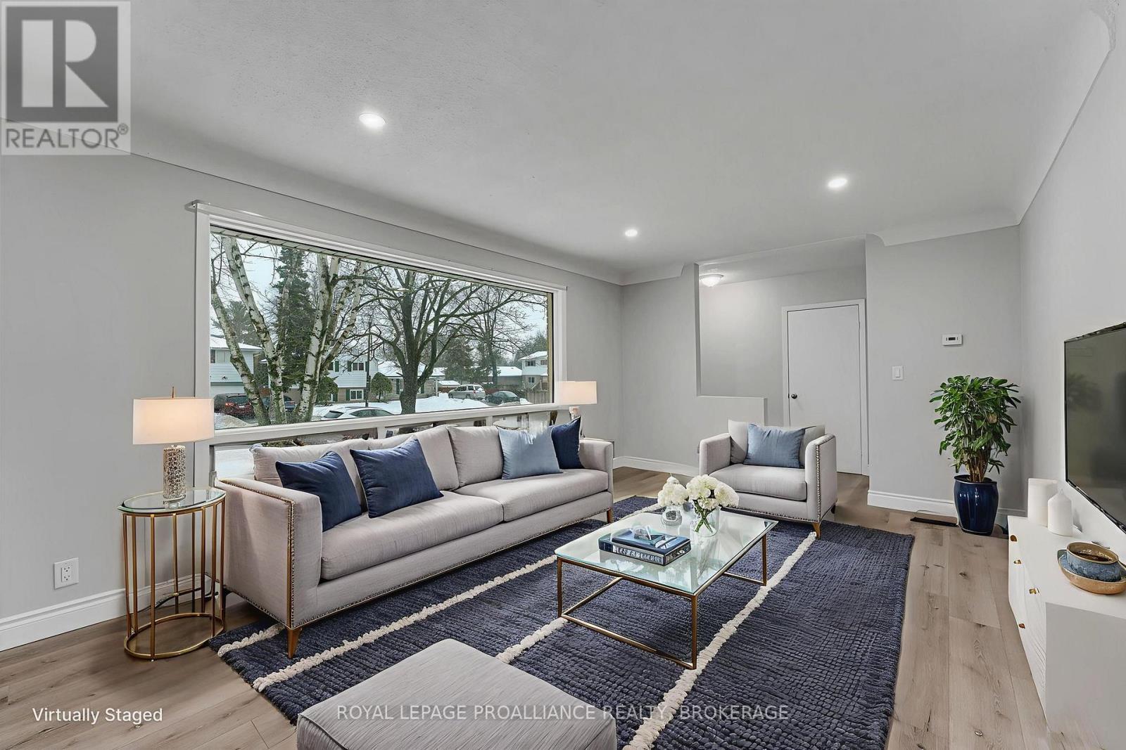 Virtually Staged Image - 1080 Hudson Drive, Kingston (South Of Taylor-Kidd Blvd), ON - Indoor Photo Showing Living Room