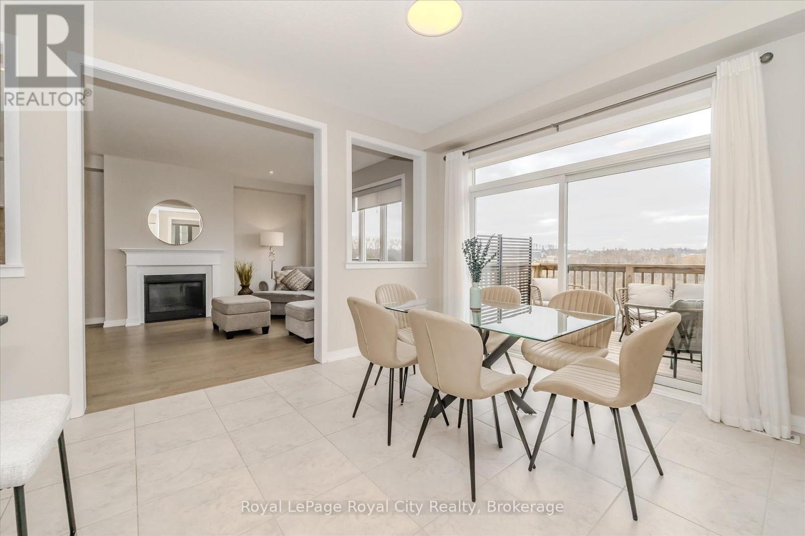 262 Dolman Street, Woolwich, ON - Indoor Photo Showing Dining Room With Fireplace