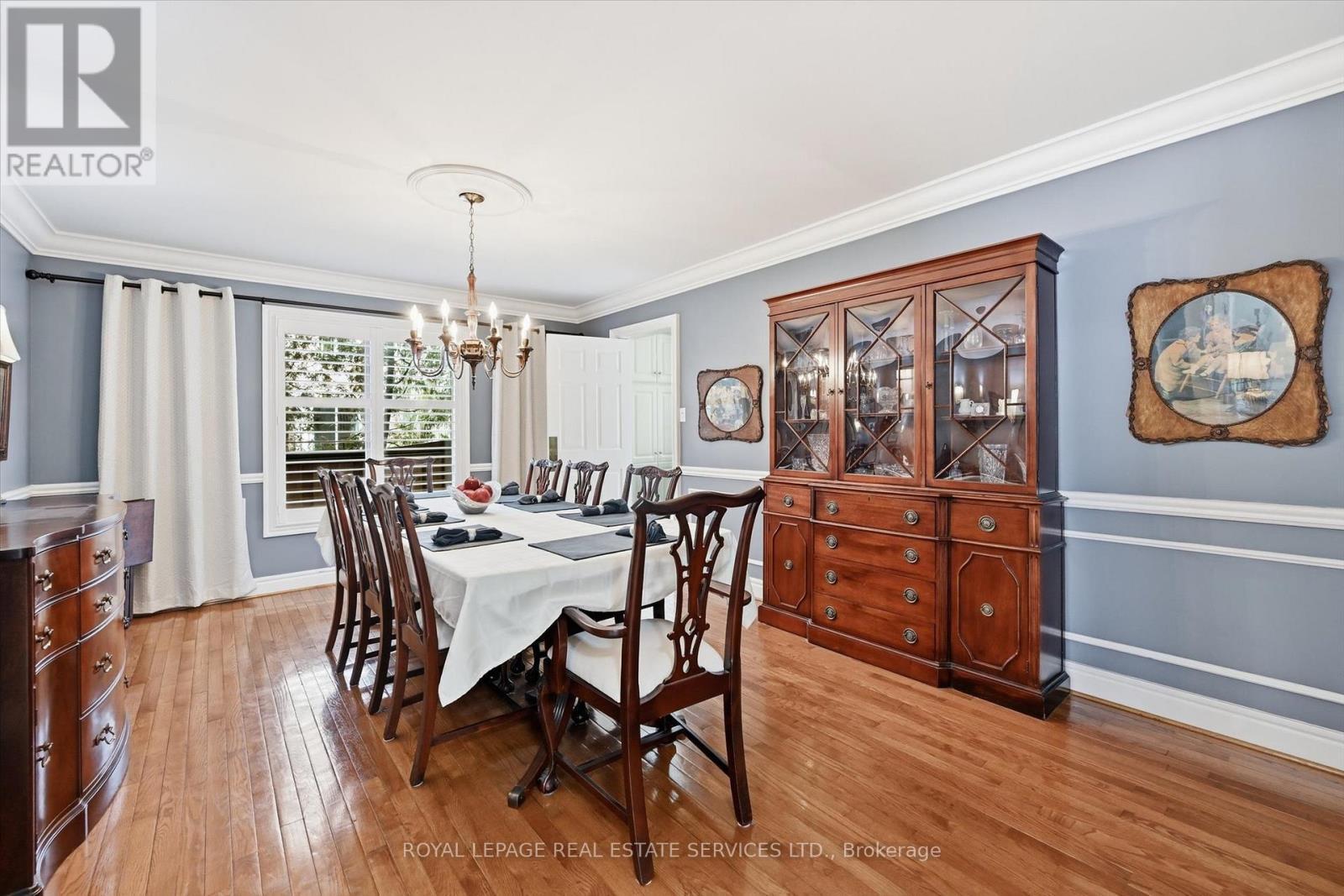 Elegant Dining Room with Hardwood Flooring - 2017 Peak Place, Oakville, ON - Indoor Photo Showing Dining Room