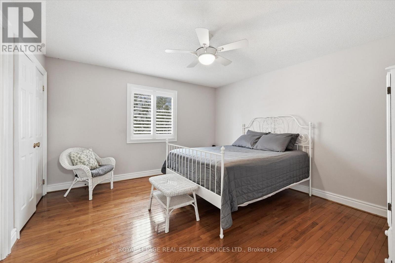 Second Bedroom Features Hardwood Flooring - 2017 Peak Place, Oakville, ON - Indoor Photo Showing Bedroom
