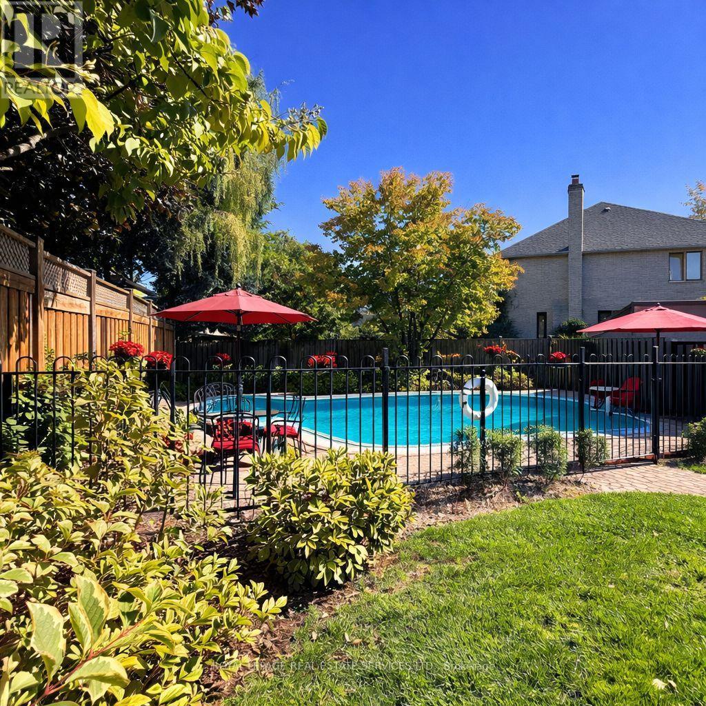 The Grounds are Designed for Summer Living - 2017 Peak Place, Oakville, ON - Outdoor With In Ground Pool