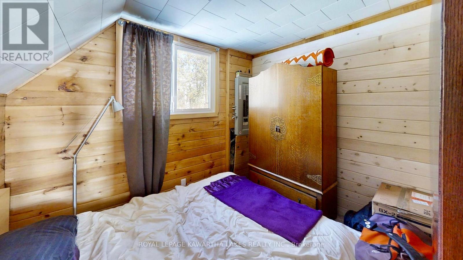 8 Fr 62 Street, Trent Lakes, ON - Indoor Photo Showing Bedroom